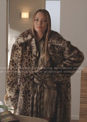 Dominique’s striped dress and leopard print coat on Dynasty