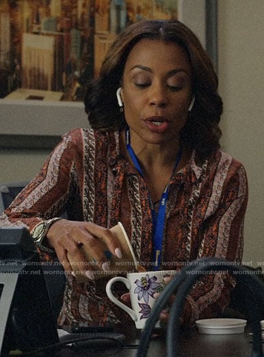 Mia’s patterned stripe blouse on The Morning Show