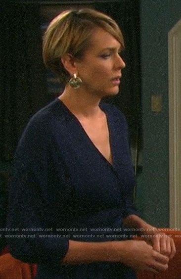 Nicole’s navy open back jumpsuit on Days of our Lives