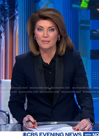 Nora’s navy contrast shawl collar blazer on CBS Evening News