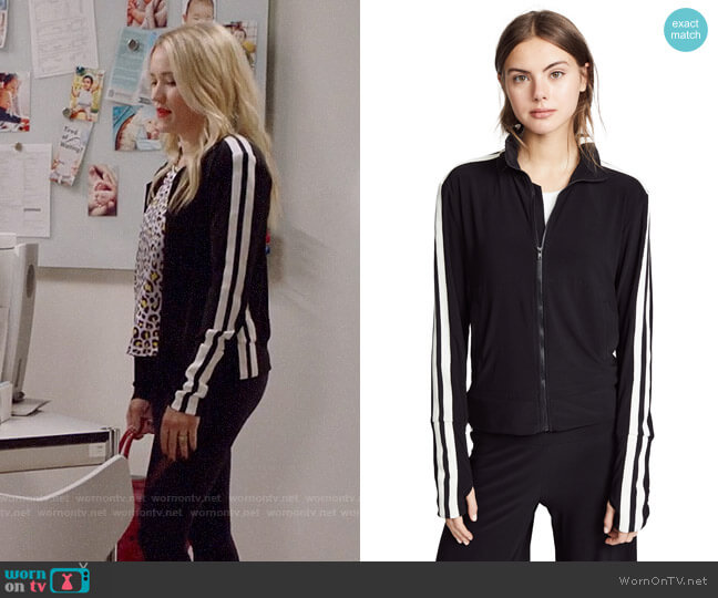 Norma Kamali Side Stripe Turtle Track Jacket worn by Roxy Doyle (Emily Osment) on Almost Family