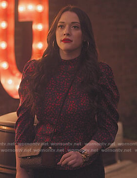 Jules’s blue and red floral blouse on Dollface