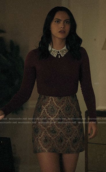 Veronica’s red sweater with embellished collar and patterned skirt on Riverdale