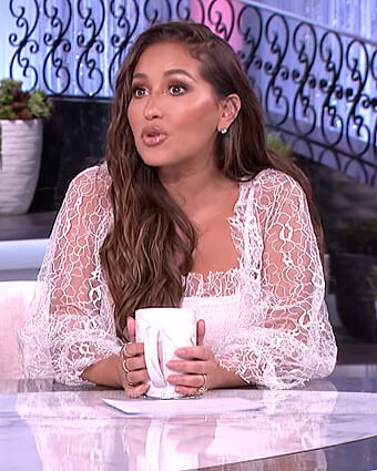 Adrienne’s white lace trim dress on The Real