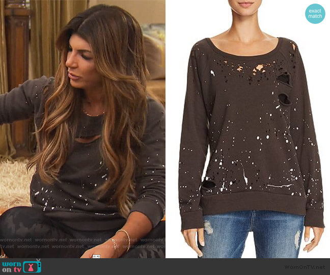 Chaser Distressed Splatter Print Sweatshirt worn by Teresa Giudice on The Real Housewives of New Jersey