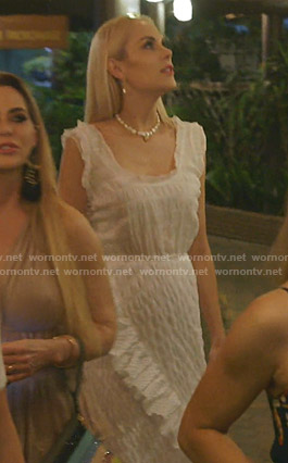 Kameron’s white sleeveless midi dress with ruffles on The Real Housewives of Dallas
