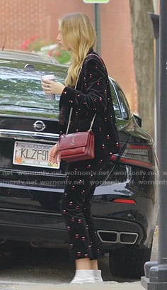 Kirby’s black heart print velvet suit on Dynasty