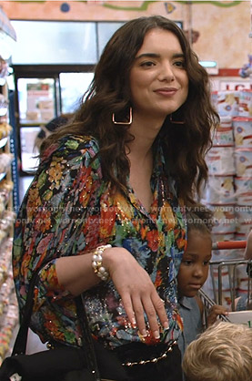 Megan’s metallic floral blouse on Shameless