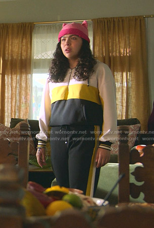 Molly’s colorblock sweatshirt and side striped pants on Marvels Runaways