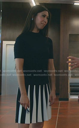 Tina’s black contrast pleated dress on Marvels Runaways