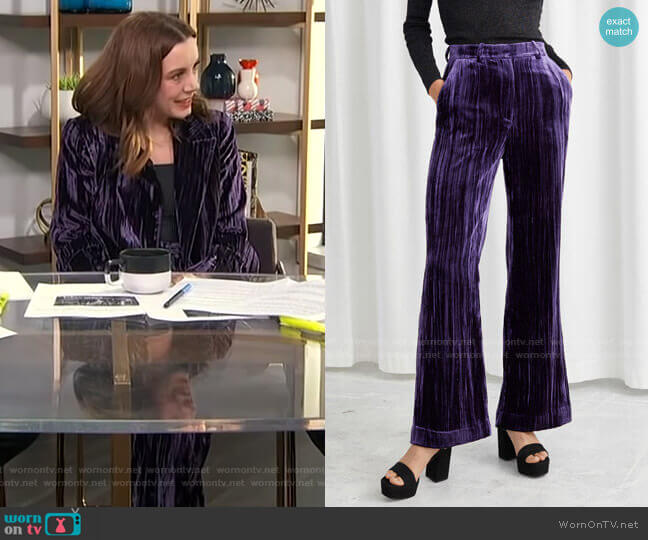 & Other Stories Crushed Velvet Kick Flare Trousers worn by Melanie Bromley on E! News