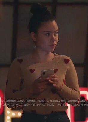 Mariana’s beige heart sweater on Good Trouble
