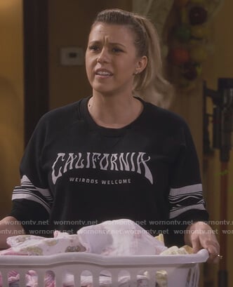 Stephanie’s black california sweater on Fuller House