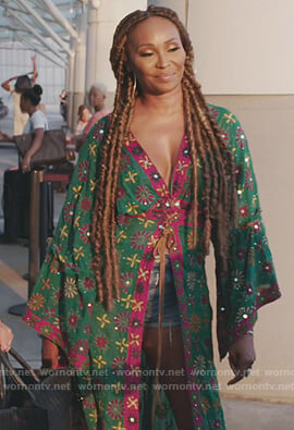 Cynthia’s green embroidered duster cardigan on The Real Housewives of Atlanta