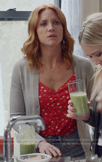 Julia’s red floral button front top and grey cardigan on Almost Family
