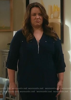 Katie’s black zip front blouse on American Housewife
