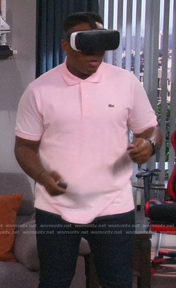 Marty’s pink polo shirt on The Neighborhood