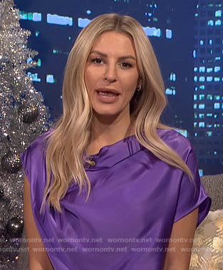 Morgan’s purple asymmetric top on E! News Nightly Pop