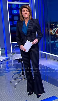 Norah’s navy pinstripe suit on CBS Evening News