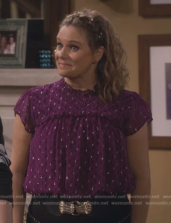 Kimmy’s purple printed metallic top on Fuller House