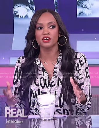Rachel Lindsay’s newspaper graffiti print blosue on The Real