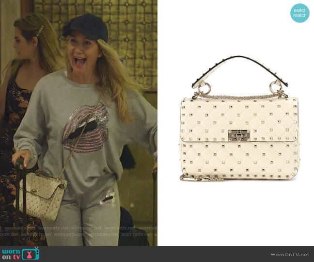Valentino Medium Rockstud Matelassé Quilted Leather Crossbody Bag worn by Kary Brittingham on The Real Housewives of Dallas