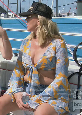 Vicki’s yellow floral bell sleeve top on The Real Housewives of Orange County