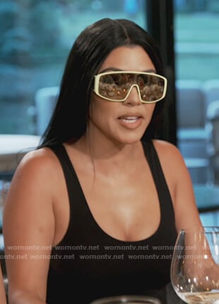 Kourtney’s yellow trim visor sunglasses on Keeping Up with the Kardashians