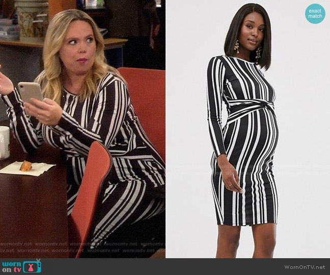 Blume Maternity Twist front stretch midi dress in black and white stripe worn by Kristin Baxter (Amanda Fuller) on Last Man Standing