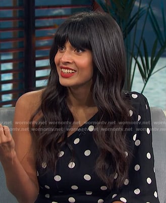 Jameela Jamil’s black polka dot one-shoulder dress on Access Hollywood