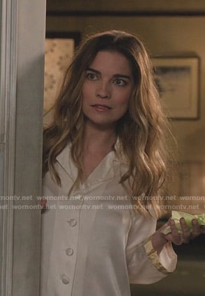 Alexis’s white pajamas with gold cuffs on Schitts Creek