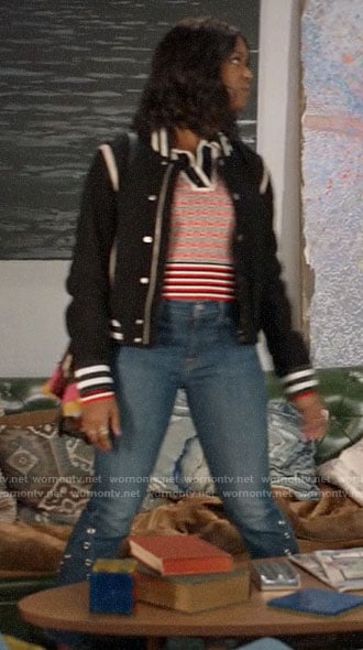 Ali’s red geometric print polo sweater and black bomber jacket on God Friended Me