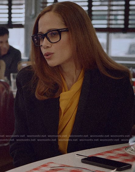 Amanda’s yellow draped neck blouse on Almost Family