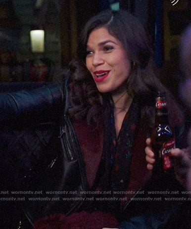 Amy’s leather jacket with red fur on Superstore