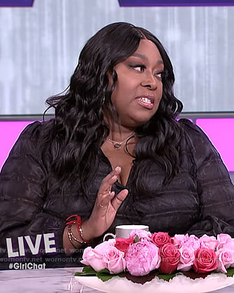 Loni’s black puffer wrap dress on The Real