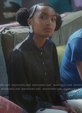 Zoey’s black dotted blouse on Grown-ish
