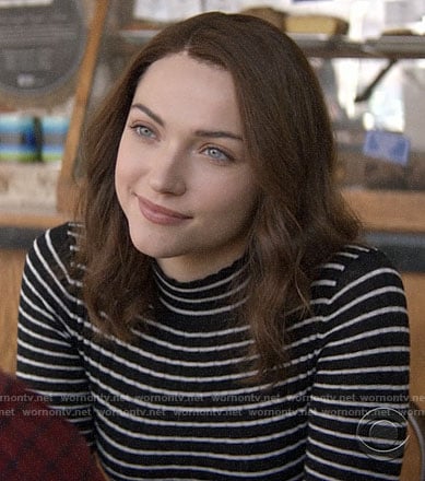 Cara’s black striped mock neck sweater on God Friended Me