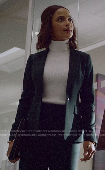 Edie’s black suit and white turtleneck on Almost Family