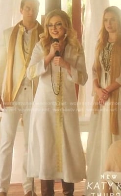 Fallon’s white and gold embroidered linen dress on Dynasty