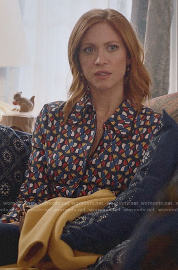 Julia’s geometric print button down blouse on Almost Family