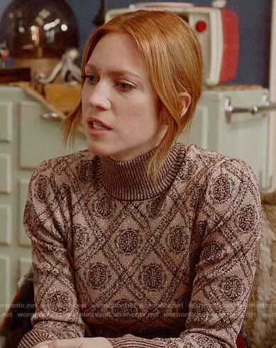 Julia’s metallic printed sweater on Almost Family