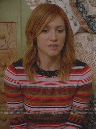 Julia’s orange striped ribbed top on Almost Family