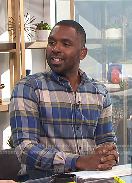 Justin’s blue and grey plaid shirt on E! News Daily Pop