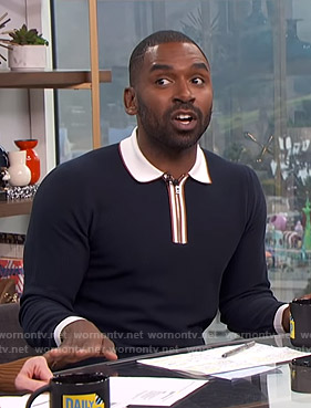 Justin’s navy collared sweater on E! News Daily Pop