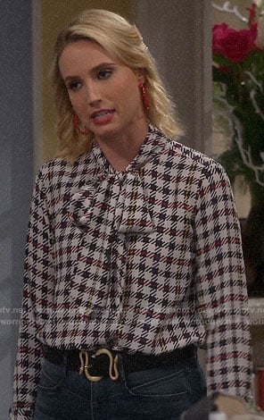 Mandy’s checked tie neck blouse on Last Man Standing