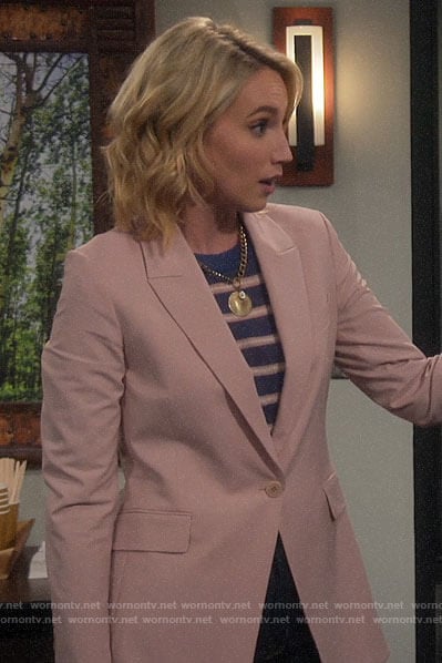 Mandy’s pink blazer and blue striped sweater on Last Man Standing