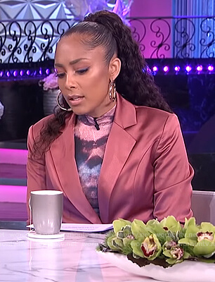 Amanda’s tie dye top and pink blazer on The Real