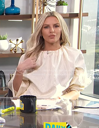Morgan’s white gathered neck blouse on E! News Daily Pop
