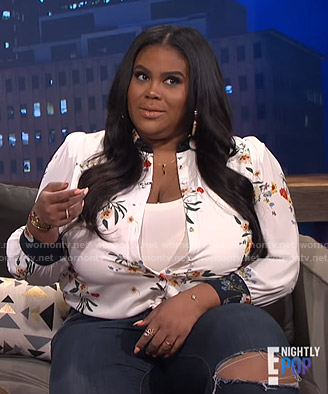 Nina’s white floral blouse on E! News Nightly Pop