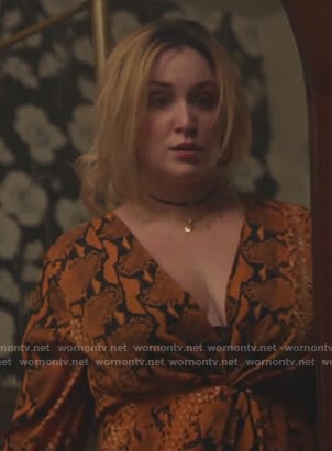 Davia’s orange snakeskin twist top on Good Trouble